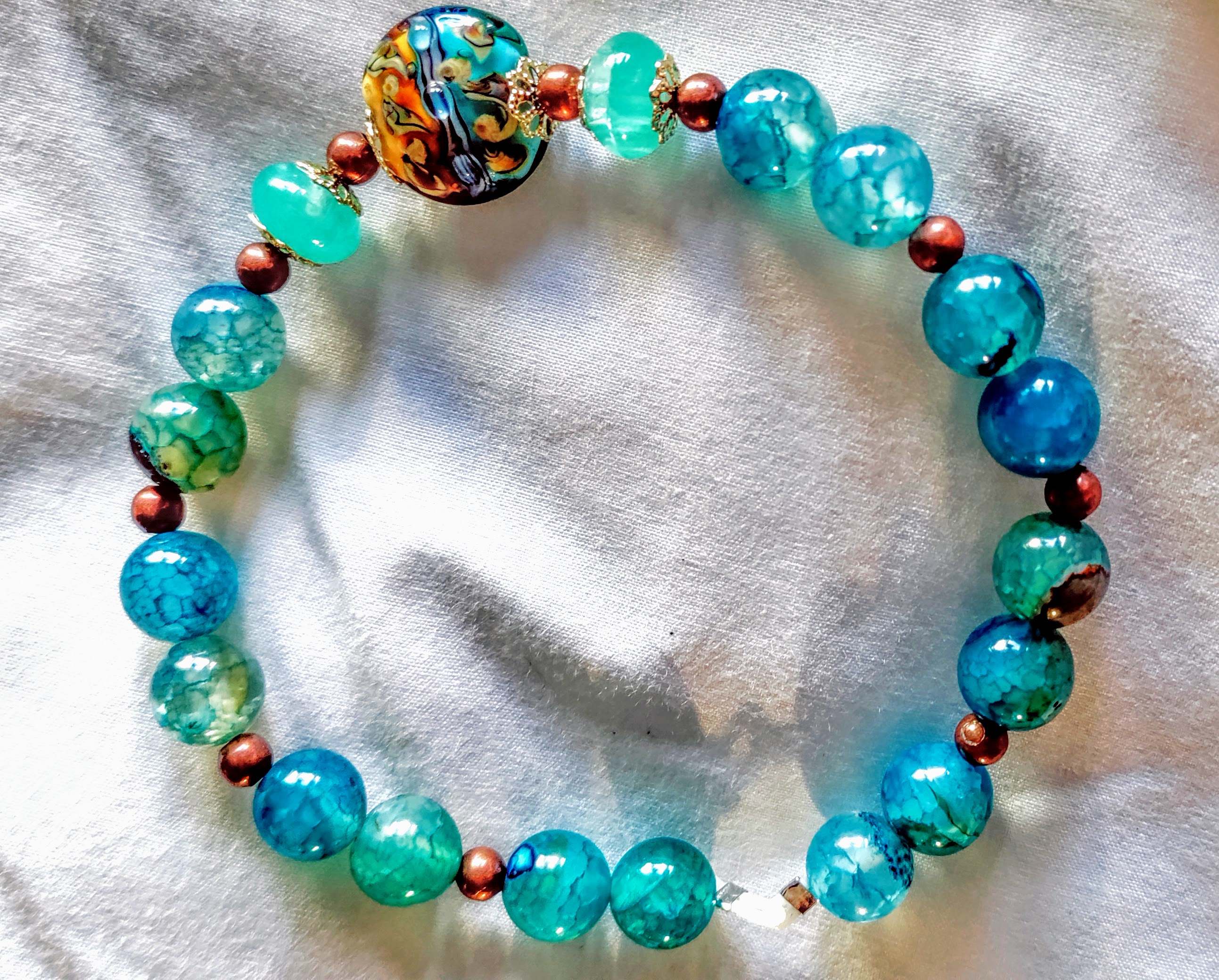 Blue crackled agate with Blue & Yellow Lampworked centerpiece